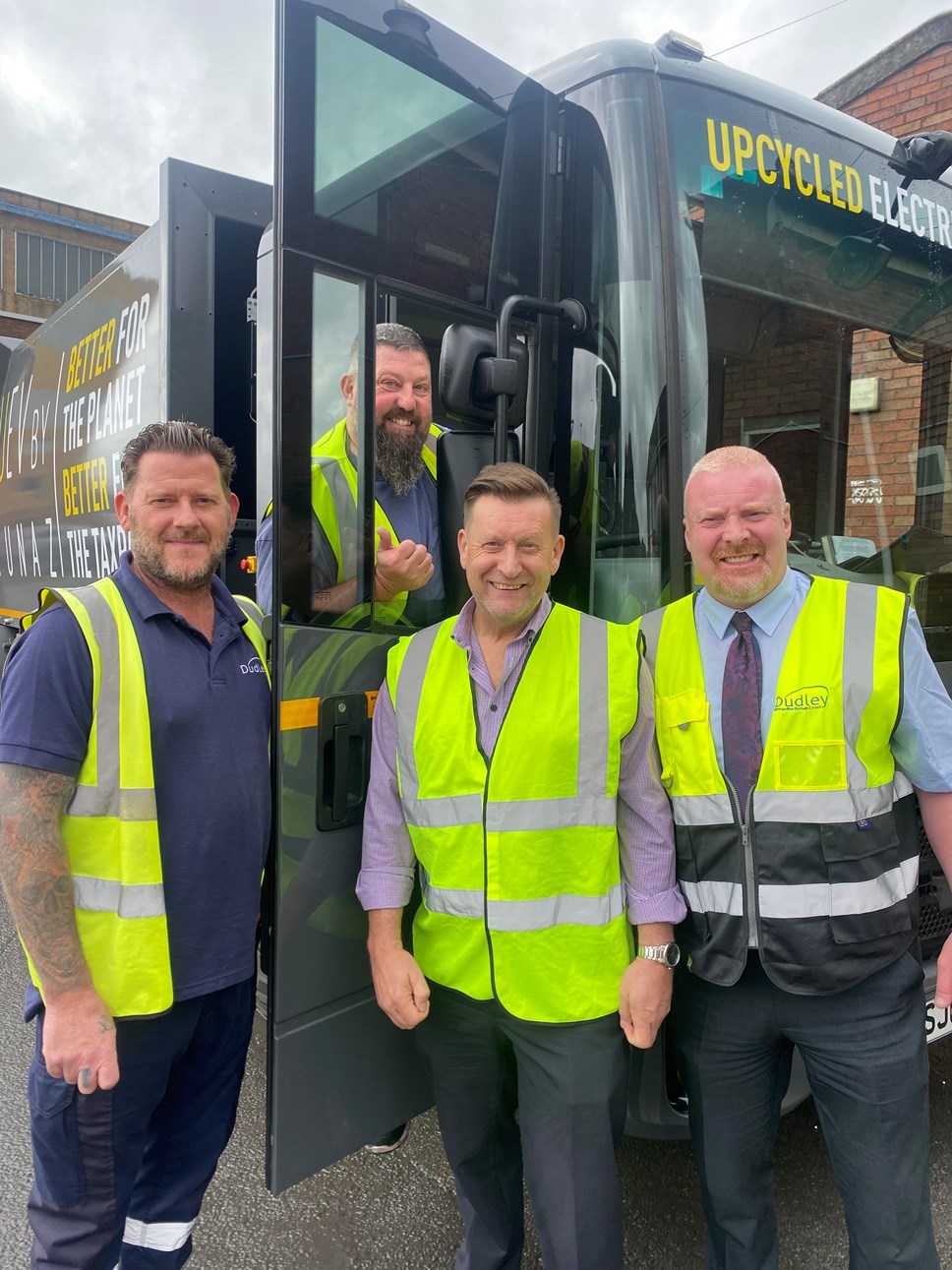 Councillors take a look at one of the Electric Vehicles that are being trialled by waste management