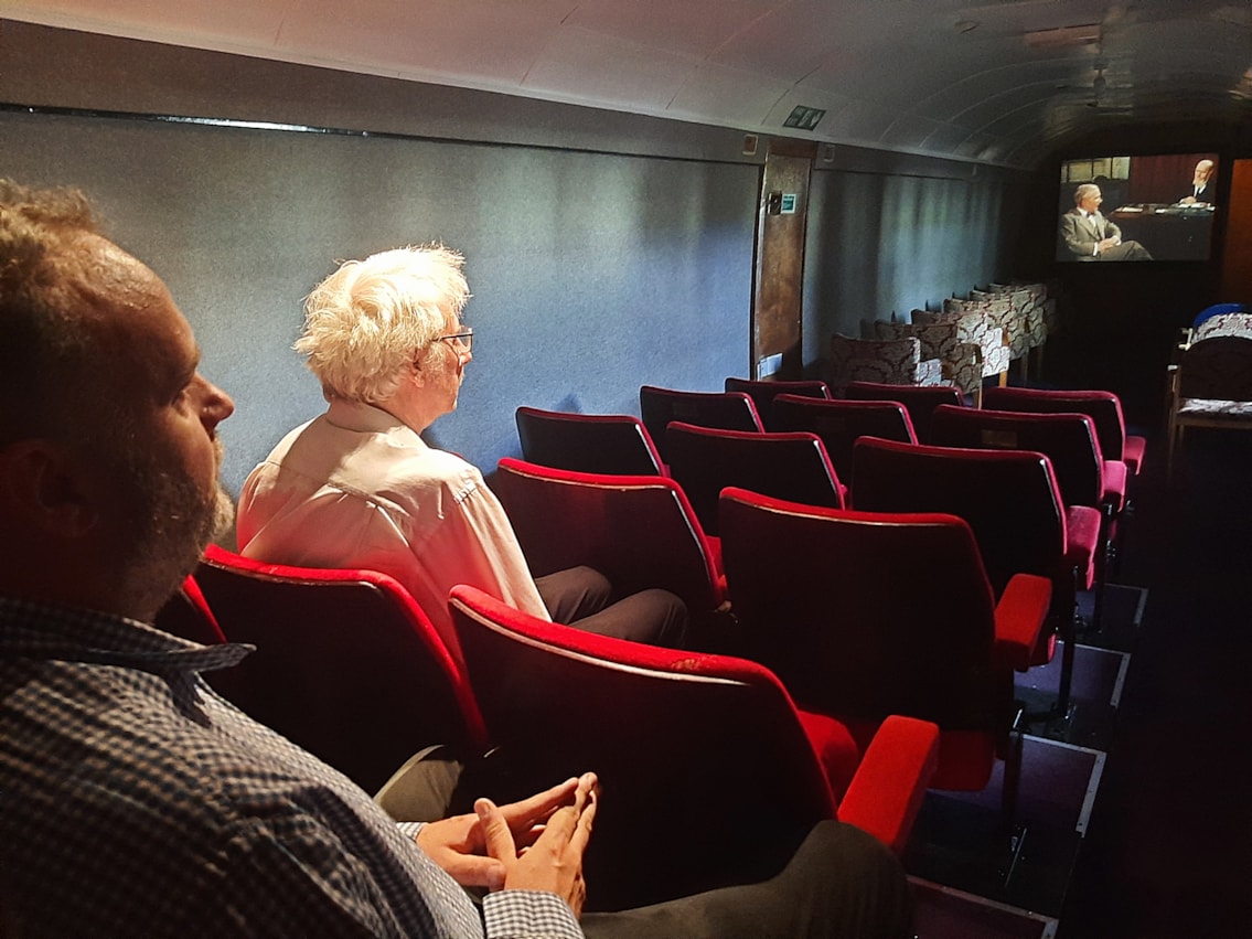 Steve Foxon and father Rob Foxon in the cinema coach. C Martin Rouse