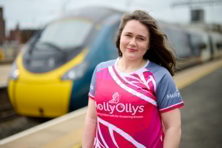 Grace Ashwell in front of Avanti West Coast Pendolino