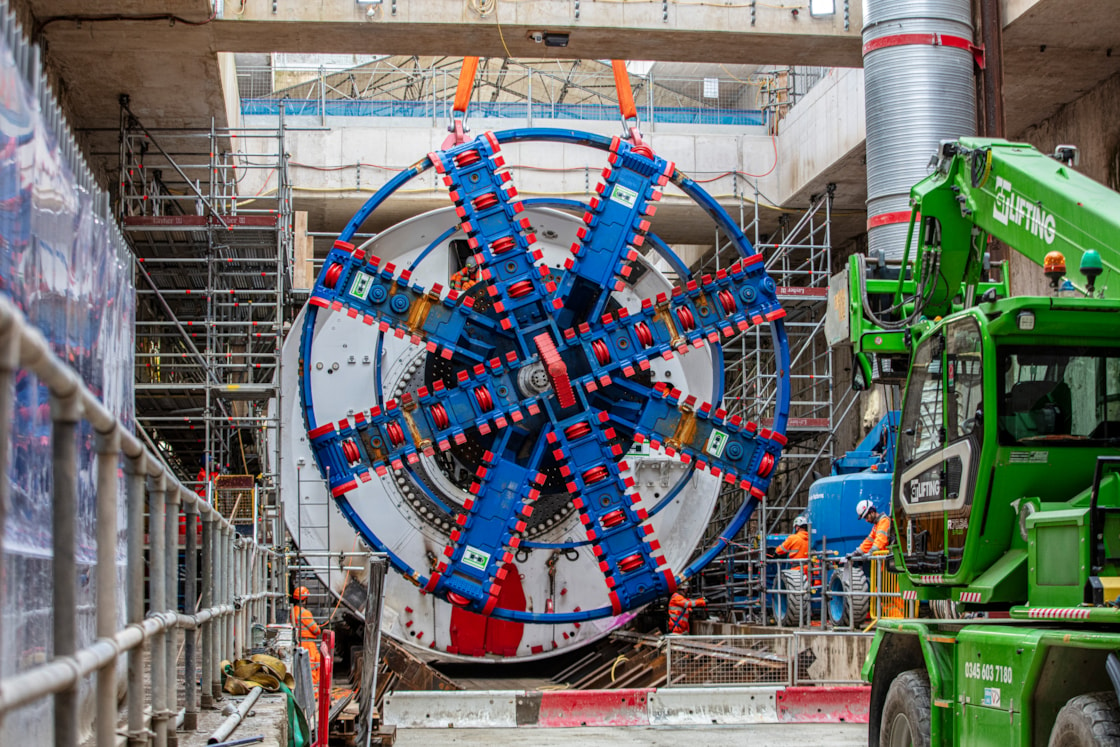 TBM Madeleine cutterhead is lowered inot place at OOC station box