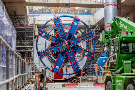 TBM Madeleine cutterhead is lowered inot place at OOC station box