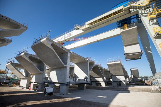 Colne Valley Viaduct pre-cast yard, January 2023: View of huge gantry crane moving huge viaduct deck segments into place, before they are transported to the viaduct site to be installed. The Colne Valley Viaduct will be made up of 1,000 individual segments.