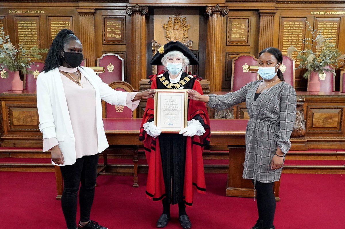 Jennifer Appleton and Tanisha Appleton from the Love and Loss Group, receiving their Civic Award from Islington Mayor Cllr Janet Burgess