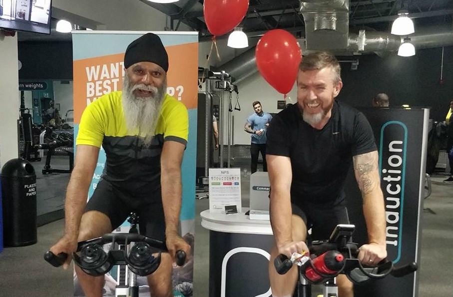 Railway signaller swaps trains for trainers in half marathon and cycling challenge: Manny Kang in training