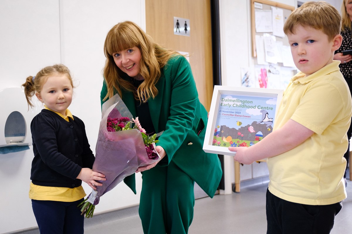 CJ and Daisy present gifts to Cllr Cowan