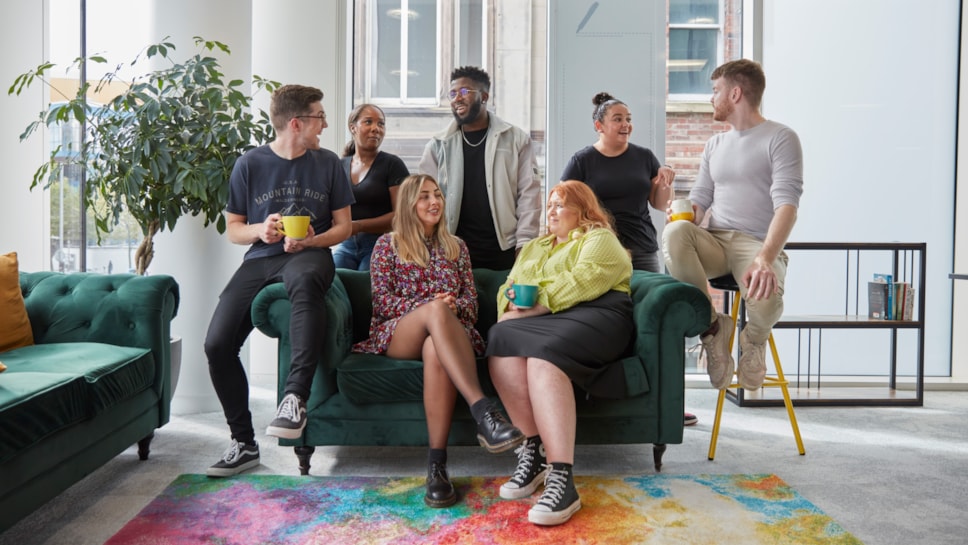 Group of colleagues on sofa