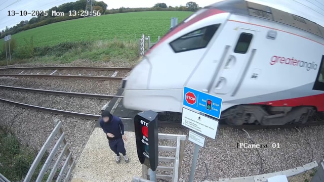 Young person's reckless game at Norfolk level crossing