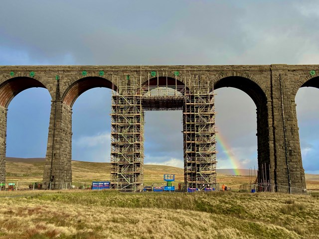 Ribblehead viaduct with rainbow in background
