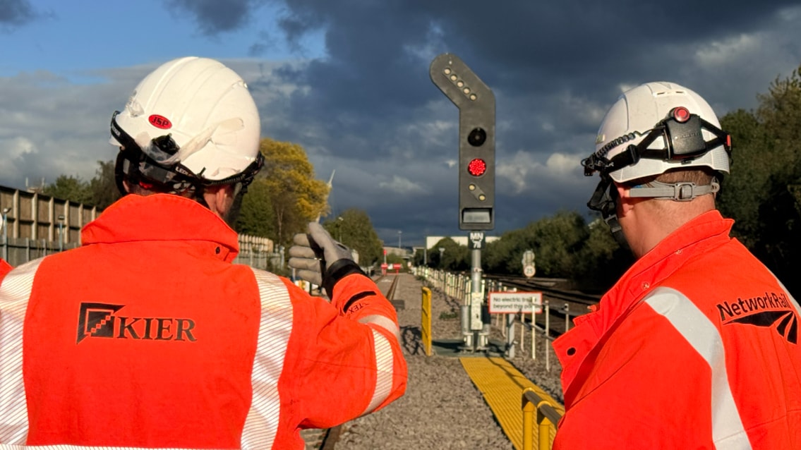 Workers testing Brewery Turnback siding during October commissioning