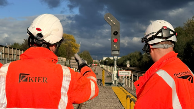 Workers testing Brewery Turnback siding during October commissioning: Workers testing Brewery Turnback siding during October commissioning