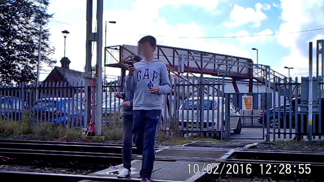 Children crossing Stone station level crossing