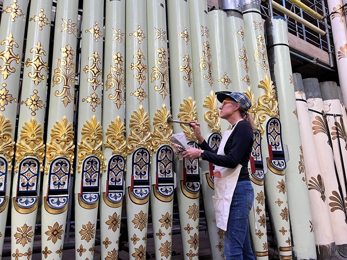Leeds Town hall organ pipes renewal: Specialist artists, Robert Woodland MBE and Debra Miller of The Upright Gilders, have taken on the painstaking task of recreating the spectacular appearance the organ pipes had when the iconic building’s Victoria Hall hosted the queen and other dignitaries for its opening night in 1858.