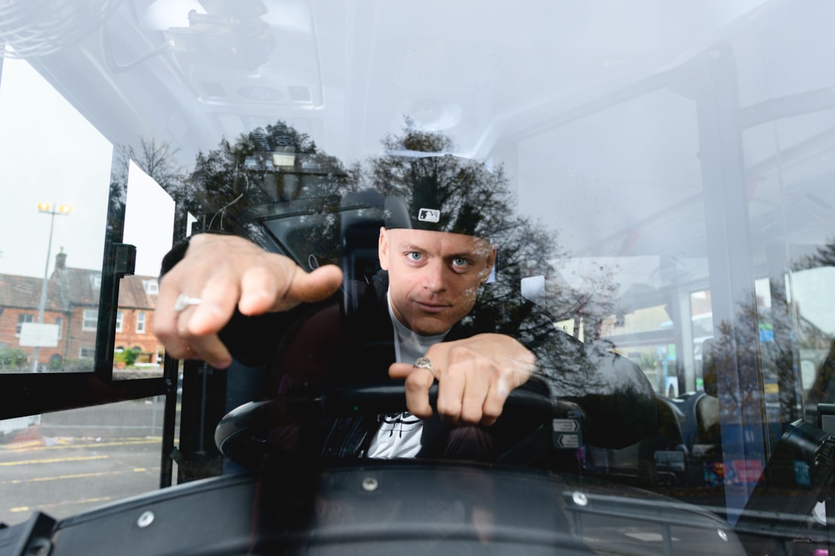 3SEVEN6 DJ Charlie ‘CHAS23’ Chamberlain behind the wheel of a service 376 bus @JonCraig_Photos