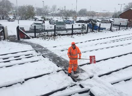 Mobile operations manager clearing a walkway in Wales (December 2017): winter, extreme weather