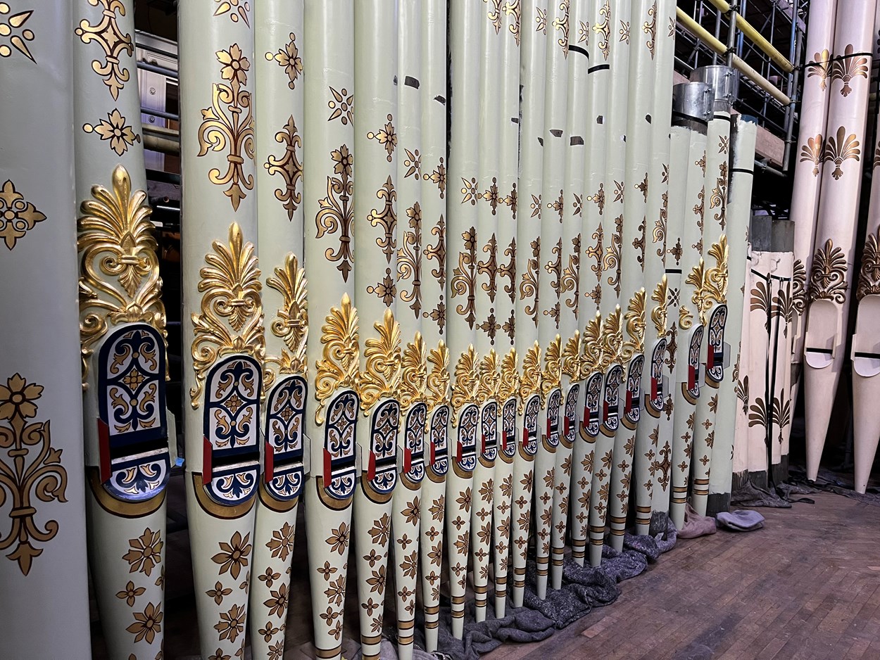 Leeds Town Hall organ pipes renewal: Specialist artists, Robert Woodland MBE and Debra Miller of The Upright Gilders, have taken on the painstaking task of recreating the spectacular appearance the organ pipes had when the iconic building’s Victoria Hall hosted the queen and other dignitaries for its opening night in 1858.