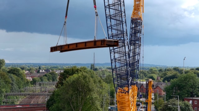 New Greek Street bridge beam suspended from crane August 2025: New Greek Street bridge beam suspended from crane August 2025