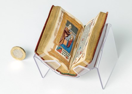 The 'Hore beate Marie virginis' is the oldest printed miniature book in our collections. It measures only 75 millimetres in height and was printed in Paris around 1510.

This Latin book of hours – a prayer book - features fifteen hand-painted woodcuts of Biblical scenes in gold leaf and brilliant co