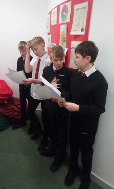 Harrison's group reciting Auld Lang Syne