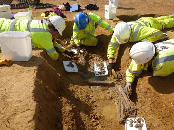 Archaeologists excavate the Offord Cluny burial ©MOLA Headland Infrastructure