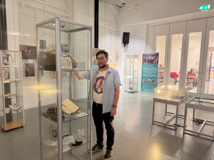 City Library Leeds 400: Librarian Antony Ramm with some of the astonishing array of memorabilia, public donations and archive material on display at Leeds City Library as part of an exhibition to mark 400 years since Leeds was awarded its first city charter.