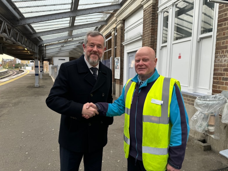 "When you enjoy what you do, you keep doing it" – Southeastern station supervisor celebrates 55 years of working on the railway: Dougie with Southeastern's Passenger Services Director David Wornham