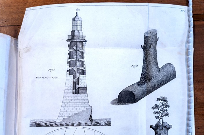 Engineery: Pages from the book containing original plans for John Smeaton's famous Eddystone Lighthouse. The beautiful first edition, penned by Smeaton himself, is on loan from Leeds Central Library, and is among the fascinating objects featured in Engineery, a new exhibition which has opened at Leeds Industrial Museum. Image credit: Anthony Robling.