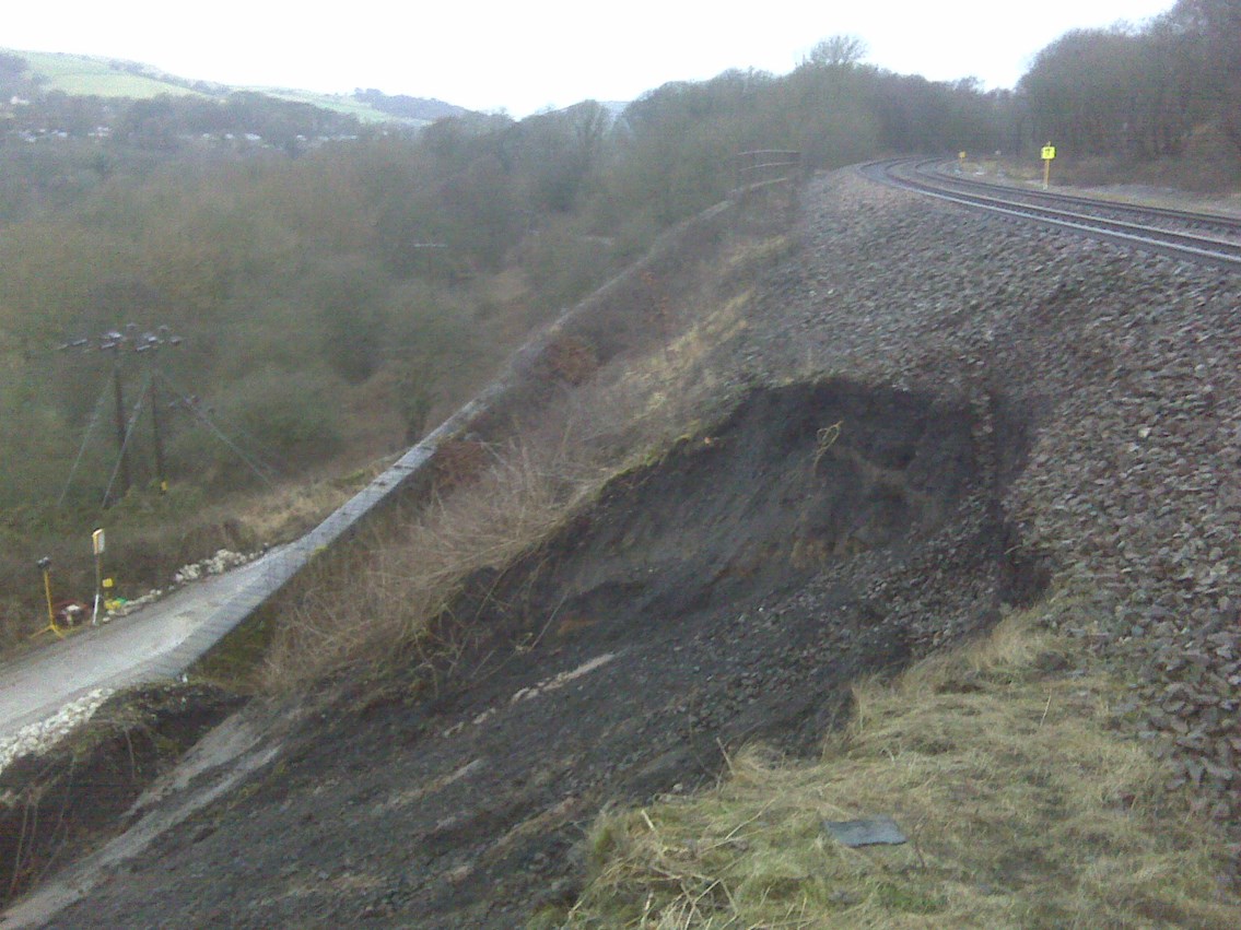 Buxworth landslip 05 Feb 2011: Landslip affecting the Manchester - Sheffield route.<br /><br />Manchester line closed, Sheffield line open with a 5 mph speed restriction.<br /><br />Both l;ines open at 20 mph for Monday morning rush hour.