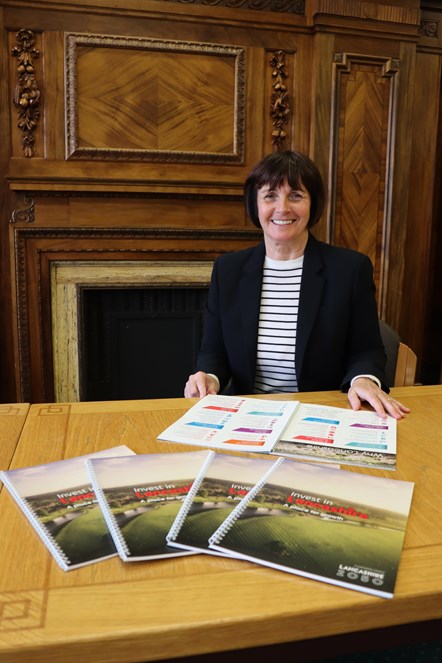 Cllr Phillippa Williamson with the Invest in Lancashire brochure