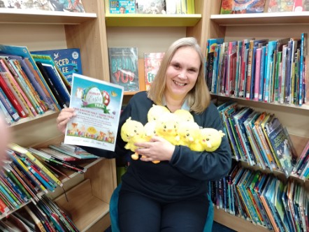 Stephanie Rhoden GLL libraries partnership manager with Easter chicks