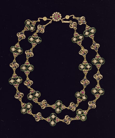 Gold enamelled necklace with pearls, rubies and garnets, 16th - 17th century. Image © National Museums Scotland