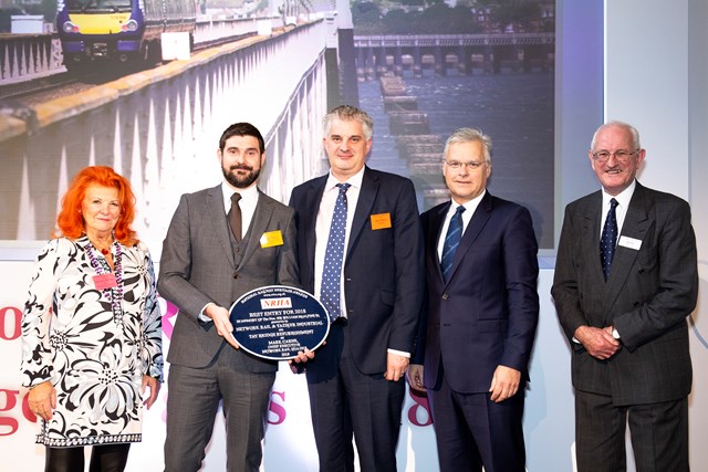 Tay Bridge claims top prize at railway heritage awards: Tay Bridge - Mark Wilson of Network Rail (2nd left) and Jason Worrall of Taziker (centre) with Lady McAlpine, Mark Carne, former Network Rail CEO and John Ellis of the NRHA