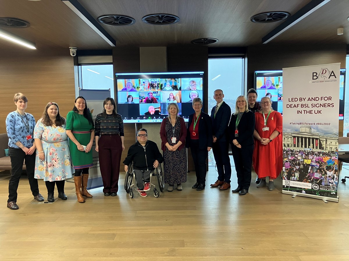 Minister for Social Justice and Chief Whip Jane Hutt with Disability Wales and British Deaf Association staff