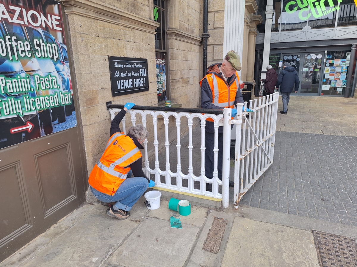 An image of volunteers working to improve Ilkley Station