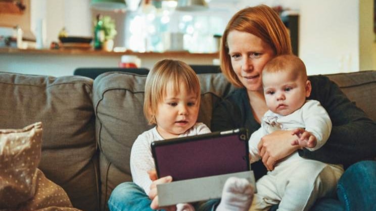 Mother-children-sofa-on-tablet-hero-article-D