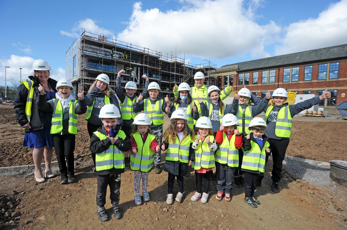 Head Teacher Tina Gaitens and pupils with Ronnie Burrows from Flemings visit the site of Crosshouse Primary