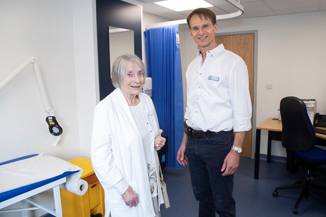 Patient Gwen Smith shown around by Dr Peter Young