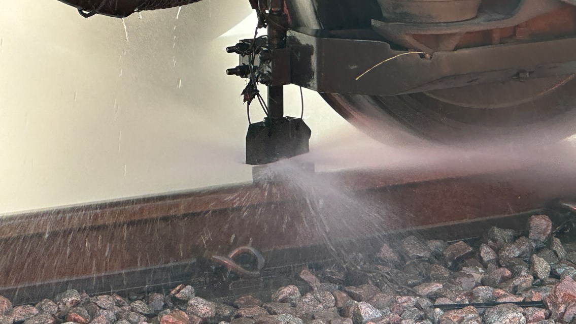 High pressure water jets are used to blast leaves off the lines