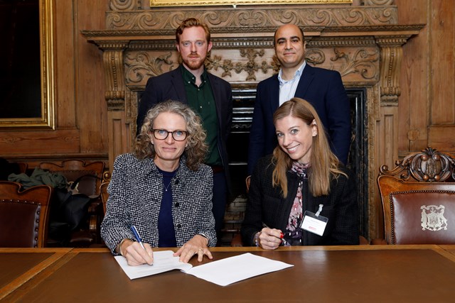 Edinburgh Tunstall MoU: Representatives from the University of Edinburgh and Tunstall Healthcare Group signing a Memorandum of Understanding.

(Back row, left to right: Matthew Barras, Lead Innovation Engineer, Tunstall; Professor Kia Nazarpour, Personal Chair of Digital Health, University of Edinburgh. Front row, left to right: Professor Helen Hastie, Head of School of Informatics, University of Edinburgh; Patricia Wynn, Chief Health Care and Strategy Officer, Tunstall.)

Image credit: Graham Clark