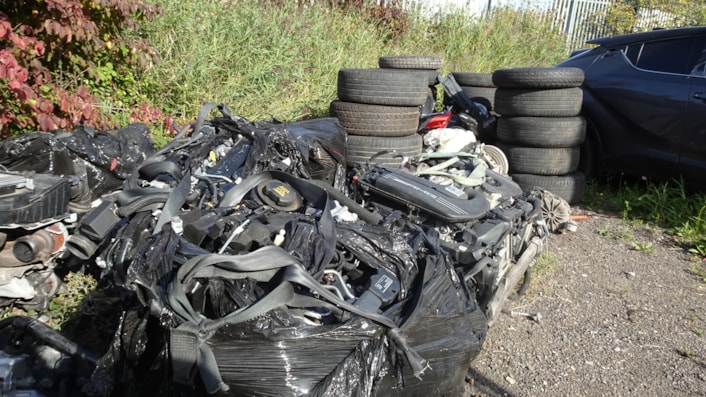 Tilbury Port - tyres and parts beside stolen car: Tilbury Port - tyres and parts beside stolen car