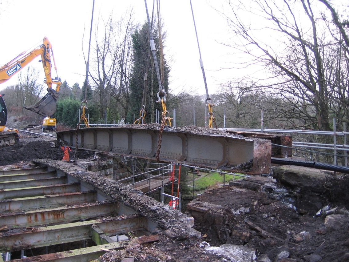 King William IV bridge: Having been cut up, old bridge girders are lifted out from the bridge.