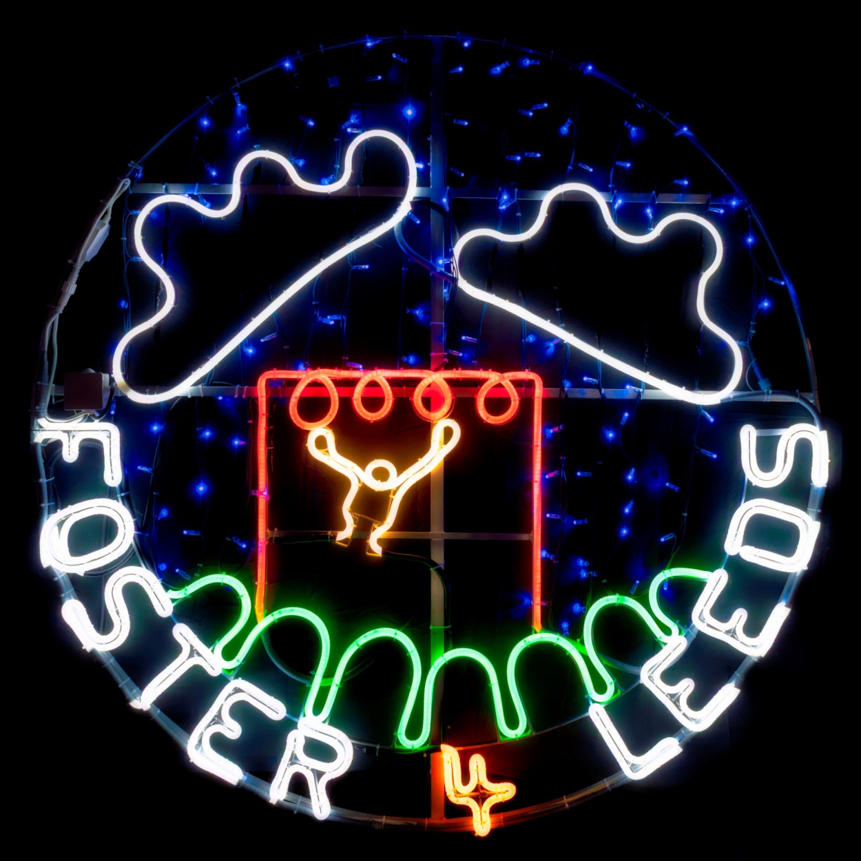 Foster 4 Leeds Light Night 6: The neon rope light created for Light Night Leeds based on a drawing by an eight-year-old boy in foster care, of going to the park.