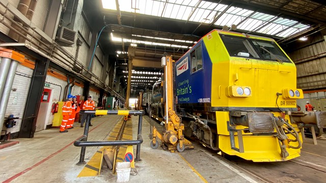 Autumn leaf blasting trains now keeping North West rail routes clear: Autumn treatment train in Wigan train shed