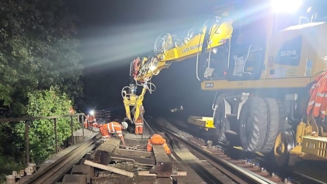 Passengers thanked as train services resume in Surrey and Hampshire after Bank Holiday closures: Renewing the wheel timbers at Cobham