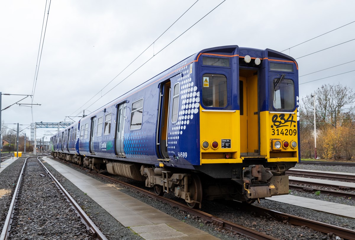 Exterior view of a 314 Class electric train sitting at the Scotrail Depot in Yoker, Glasgow on 14th December 2020. The train has been decommissioned and will be taken to Bo'ness where it will be converted to run on hydrogen.