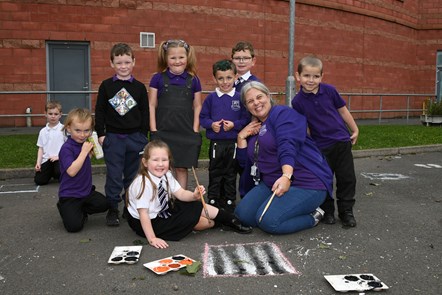 Headteacher Wendy Connelly leading outdoor art