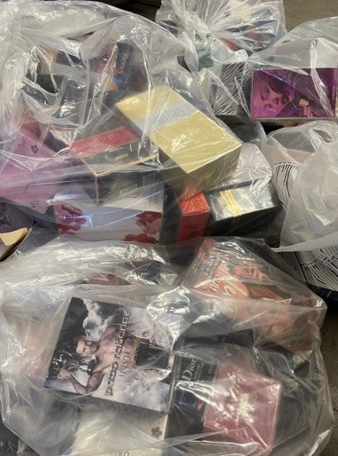 Haul of suspected fake perfume seized by Lancashire County Council's Trading Standards officers and West Lancashire Neighbourhood Policing and Licensing Team