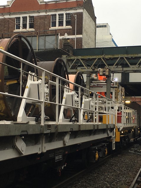 Overhead wiring train at Ilford
