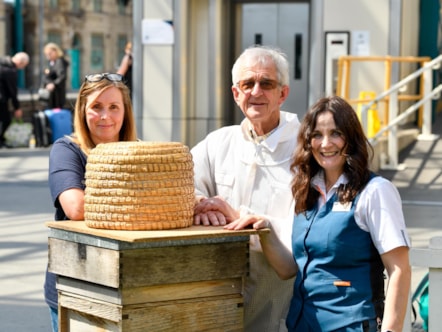 (Left to Right): Julia Brown (Avanti West Coast Sustainability Champion); Harold Bowron from Carlisle Beekeeper's Association; Diane Forrester (Avanti West Coast Community Champion) hosted a hive of activity at Carlisle station to mark World Bee Day