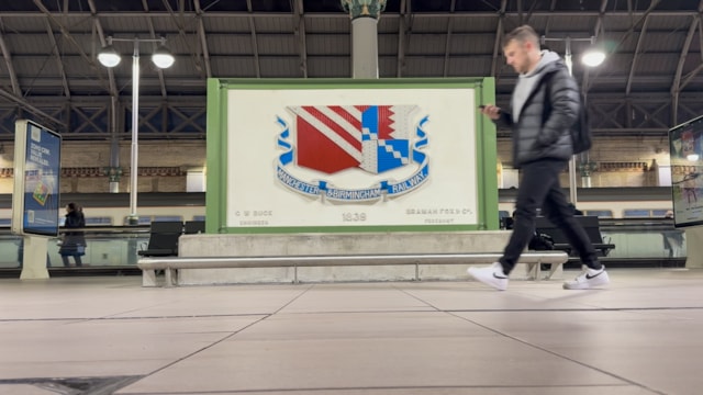 PlaqueWithPasserBy: PlaqueWithPasserBy