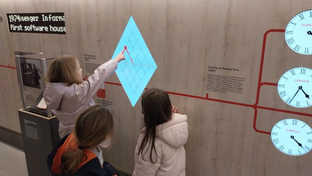 Onboard activity on Rail 200 Inspiration train: School children enjoying an interactive activity on one of the Inspiration train carriages.